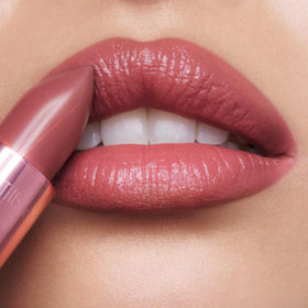 Charlotte Tilbury K.I.S.S.I.N.G Lipstick application on lips