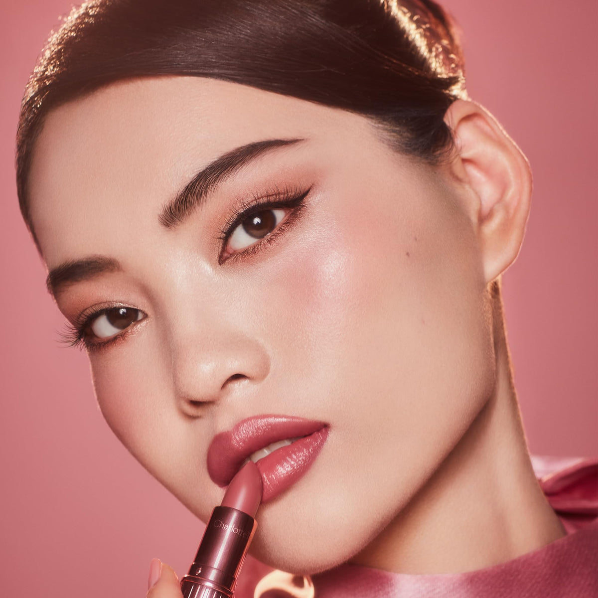 Charlotte Tilbury K.I.S.S.I.N.G Lipstick application on model