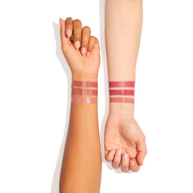 Charlotte Tilbury K.I.S.S.I.N.G Lipstick Mini Trio shades on a vanity