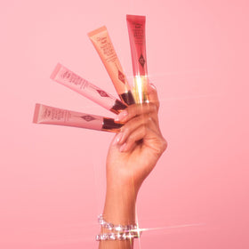 Charlotte Tilbury Pillow Talk Matte Liquid Blush Wand with makeup brush