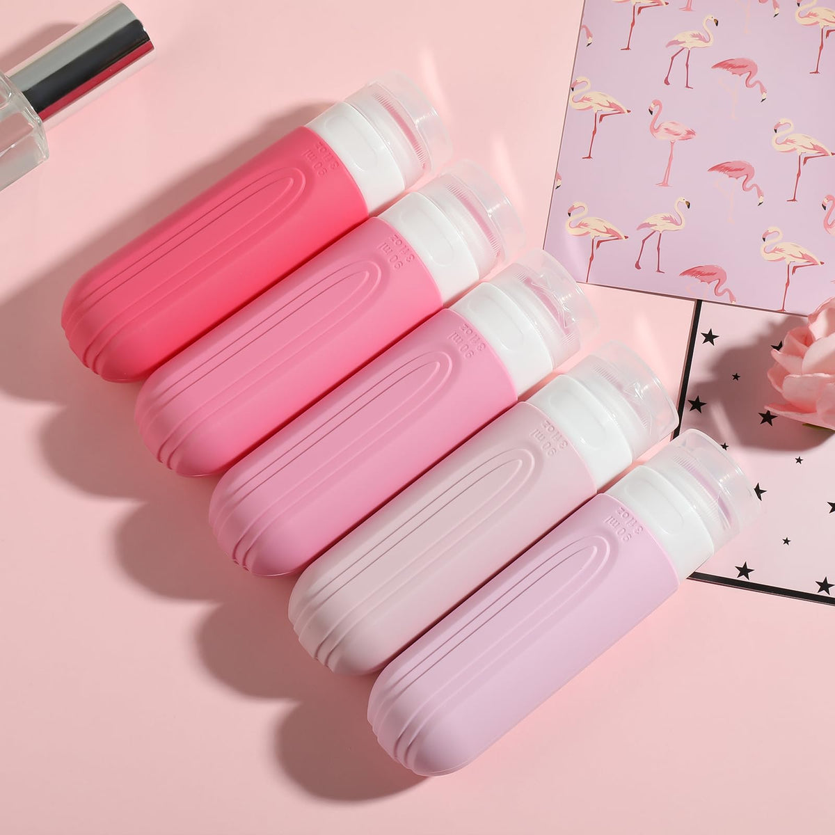 CHEODIN Travel Bottles arranged in a stylish travel setup