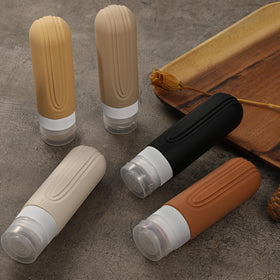 CHEODIN Travel Bottles on a travel suitcase