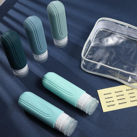CHEODIN Travel Bottles on a travel suitcase
