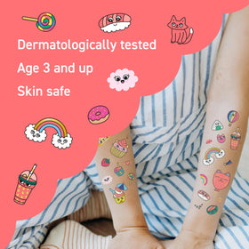 Child showing off Omy Kawaii Temporary Tattoo on arm