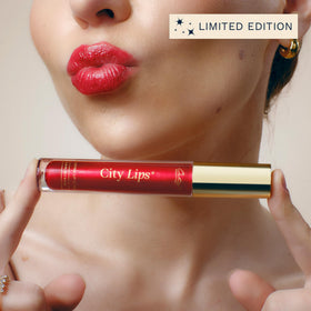 City Beauty City Lips Plumping Lip Gloss Holly with makeup accessories