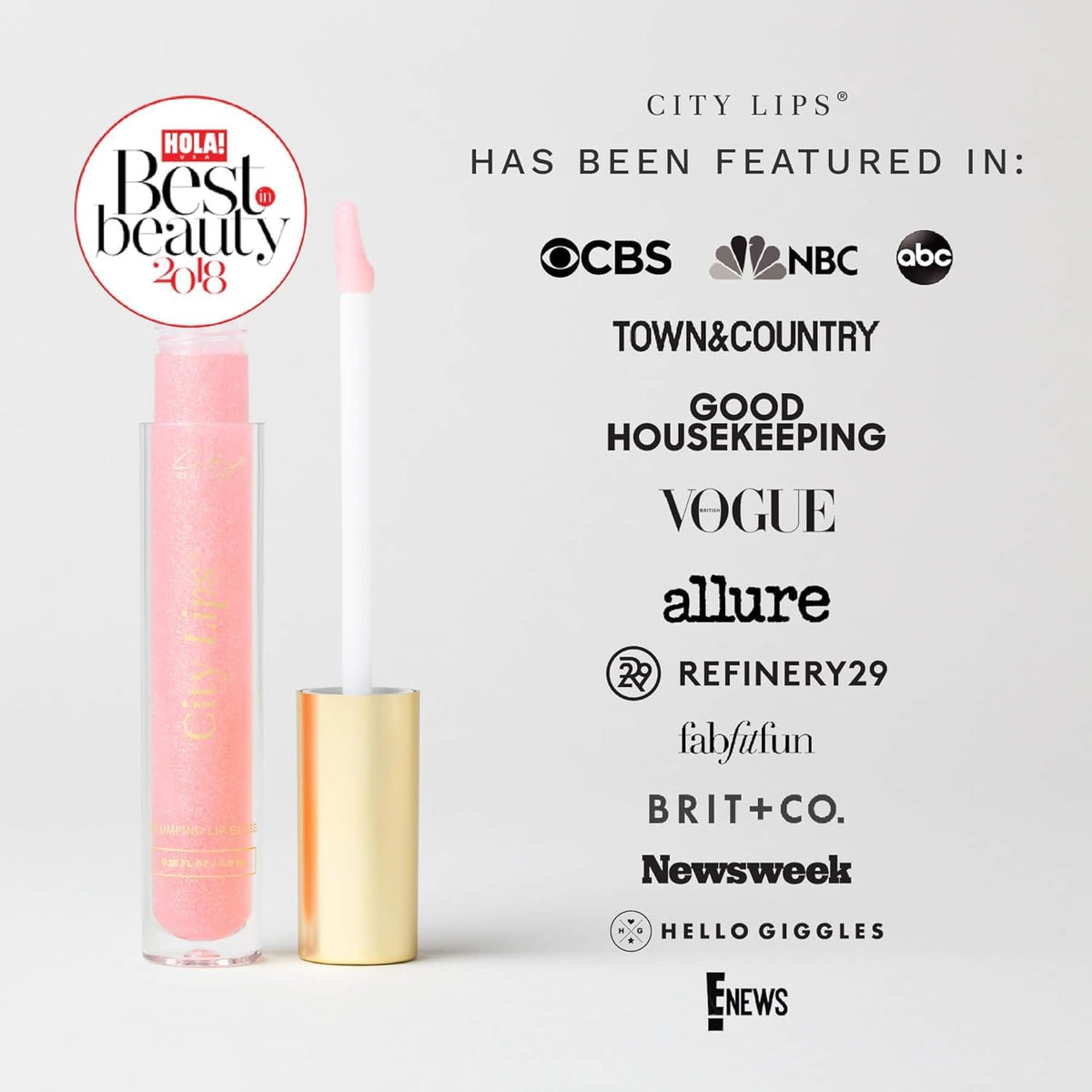 City Beauty Plumping Lip Gloss Plum Springs on a vanity