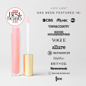 City Beauty Plumping Lip Gloss Plum Springs on a vanity