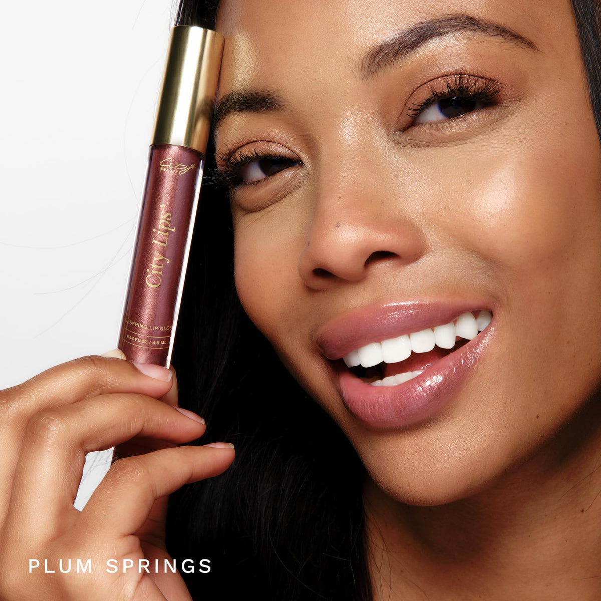 City Beauty Plumping Lip Gloss Plum Springs packaging