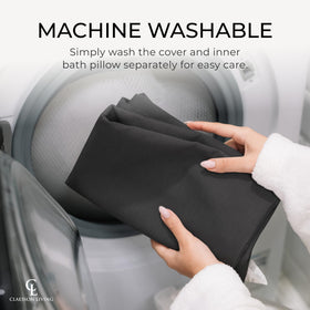 Claessonliving bath pillow with a towel and candles