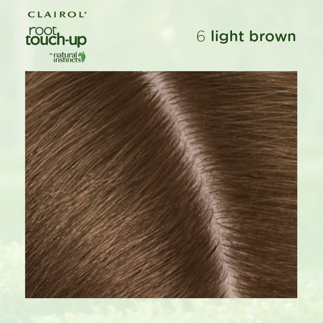 Clairol Root Touch-Up 6 Light Brown on hair strands