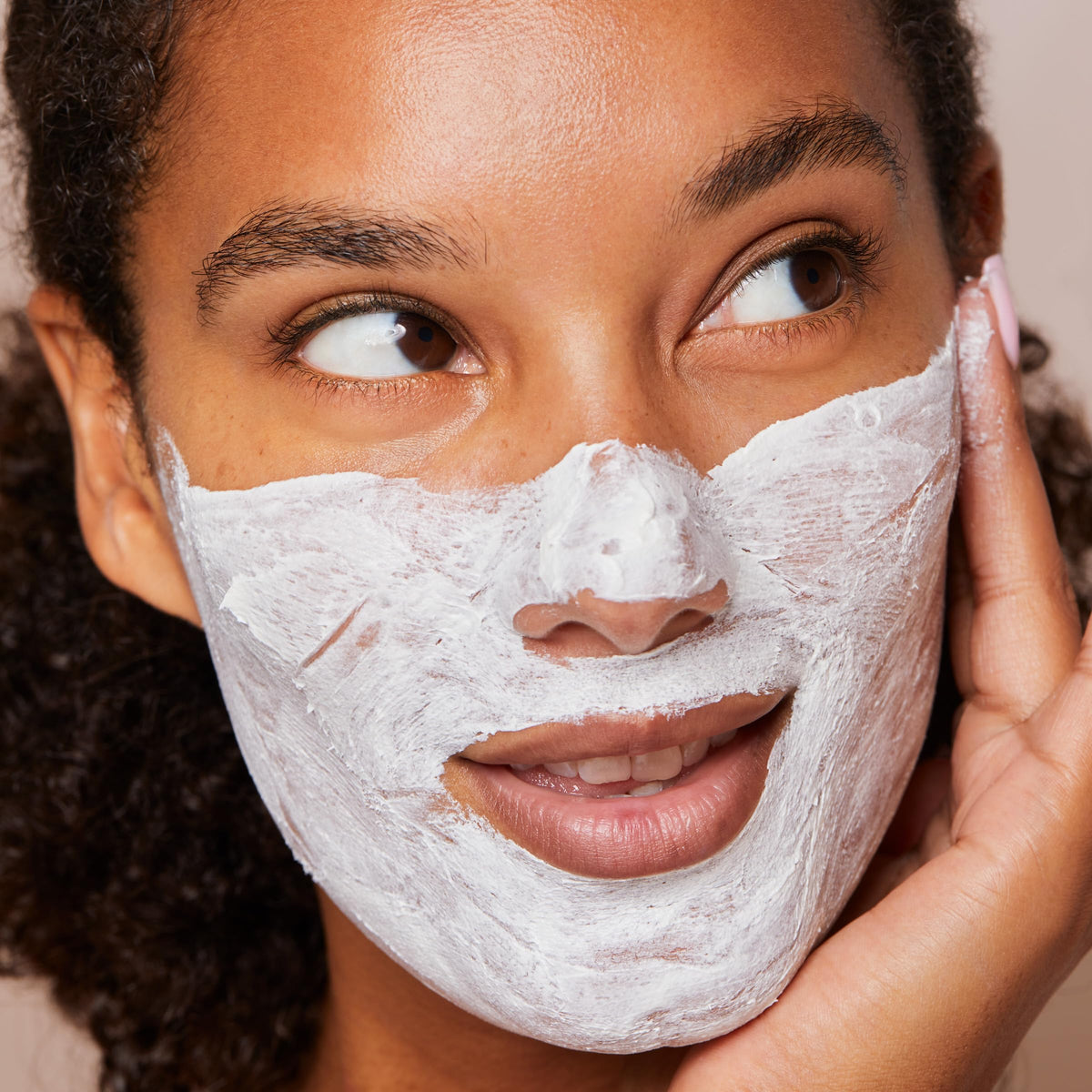 CLARINS V-Facial Intensive Wrap Face Mask in bathroom setting