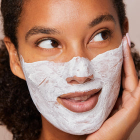 CLARINS V-Facial Intensive Wrap Face Mask in bathroom setting