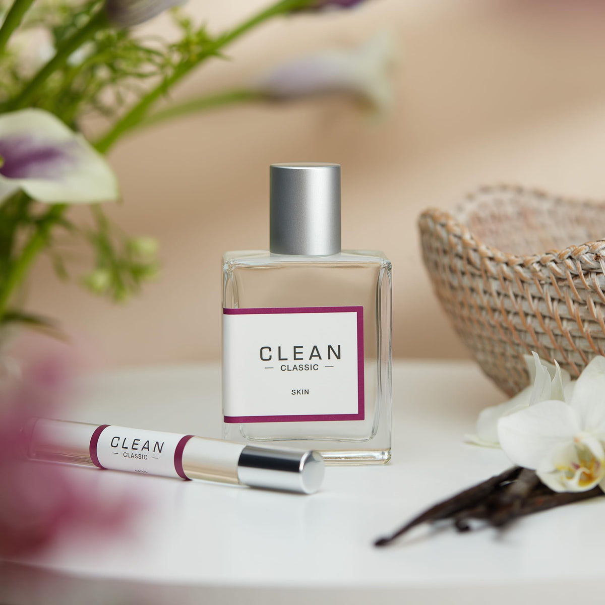 CLEAN CLASSIC Eau de Parfum 60mL bottle with floral background