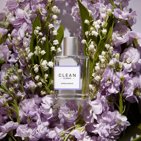 CLEAN Classic Spring Breeze Body Spray 60mL with floral background