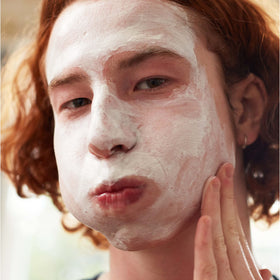 Clean & Clear Blackhead Eraser Facial Scrub in bathroom setting