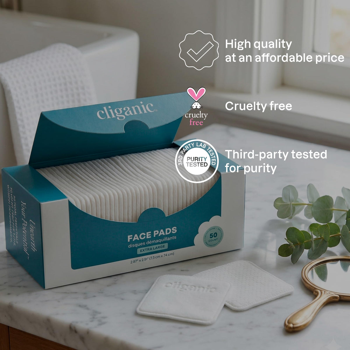 Cliganic Extra Large Face Pads 400 Count on a bathroom counter