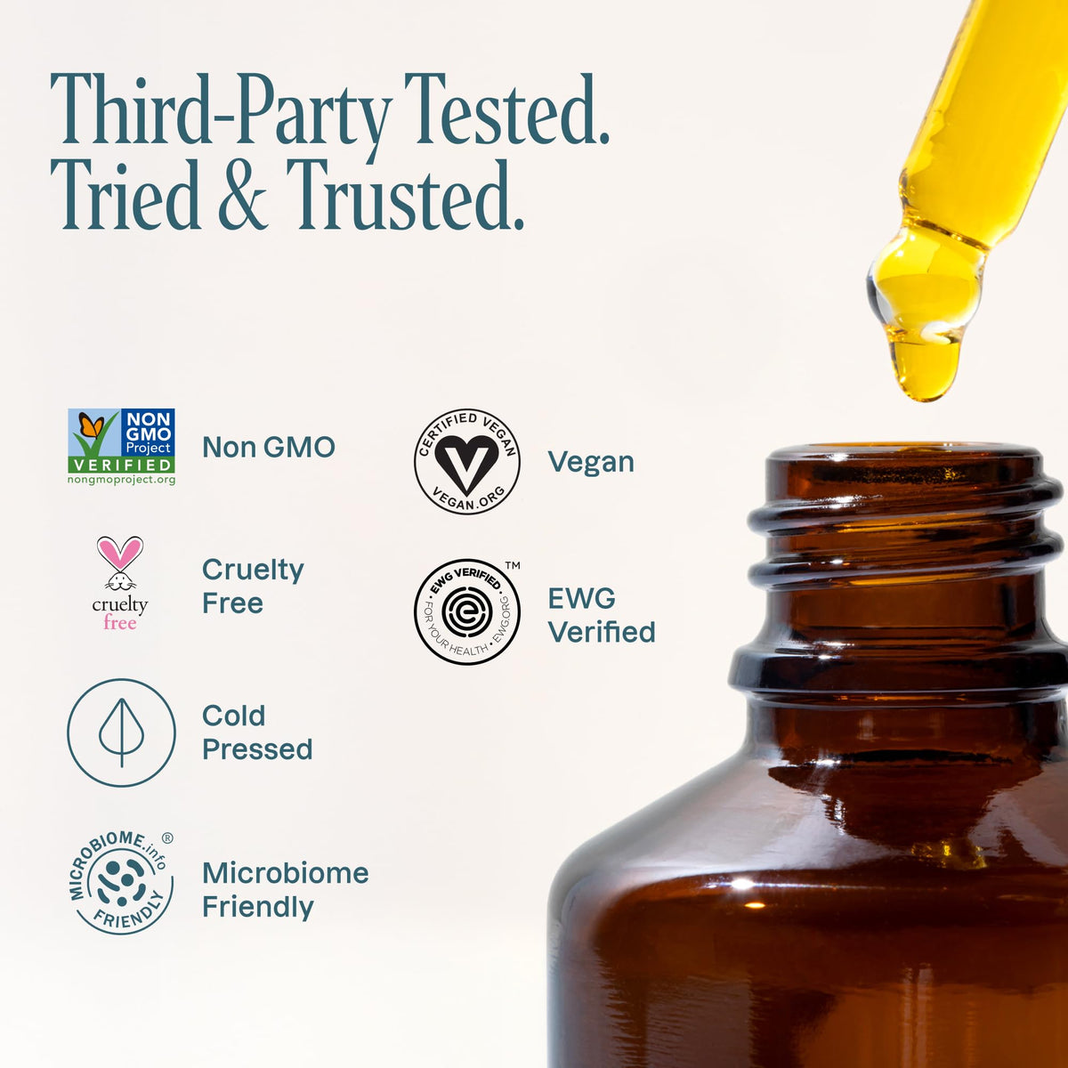 Cliganic Jojoba Oil 128oz bulk gallon on a wooden table
