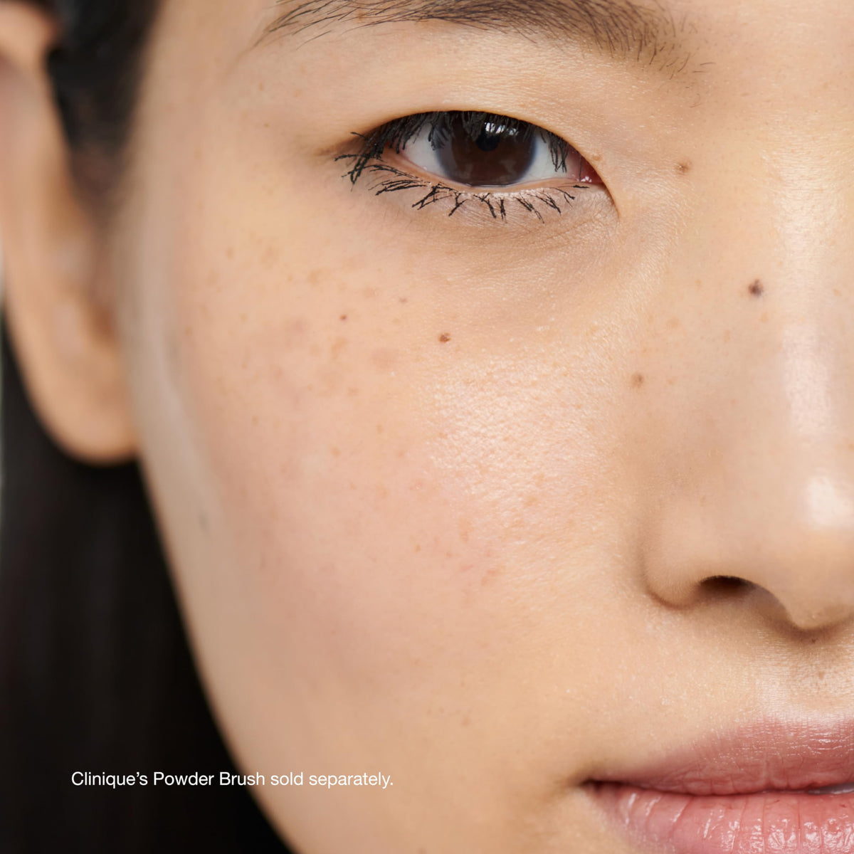 Clinique Blended Face Loose Setting Powder in use on skin