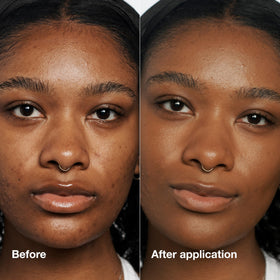 Clinique Even Better Makeup Foundation SPF 15 Mocha on a vanity with makeup tools