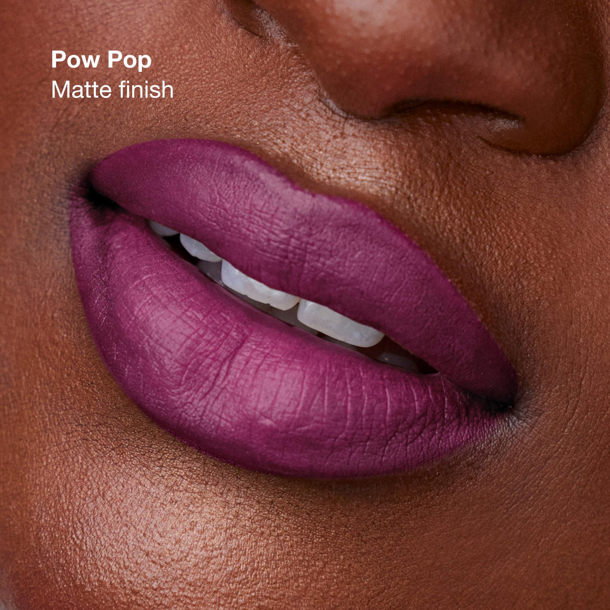 Clinique Pop Longwear Lipstick swatch on skin