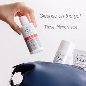 CLn Shampoo bottle on a wooden shelf