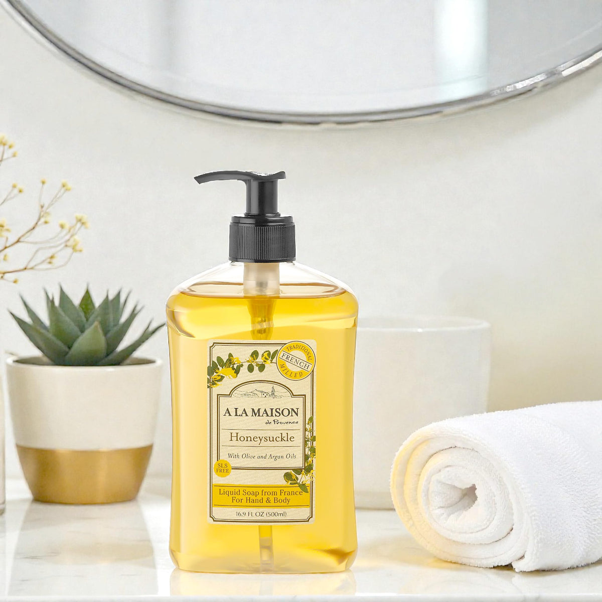 Close-up of A LA MAISON Honeysuckle Liquid Hand Soap bottle