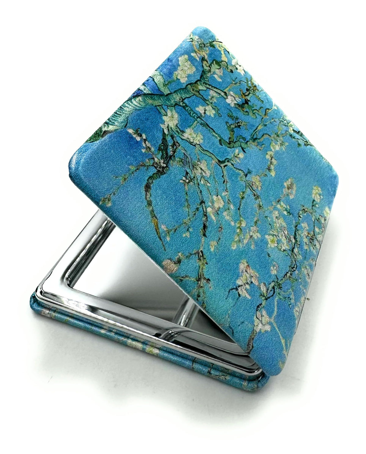 Close-up of Aeisage Compact Mirror with floral design
