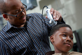 Close-up of Andis Fade Master Clipper adjustable blade