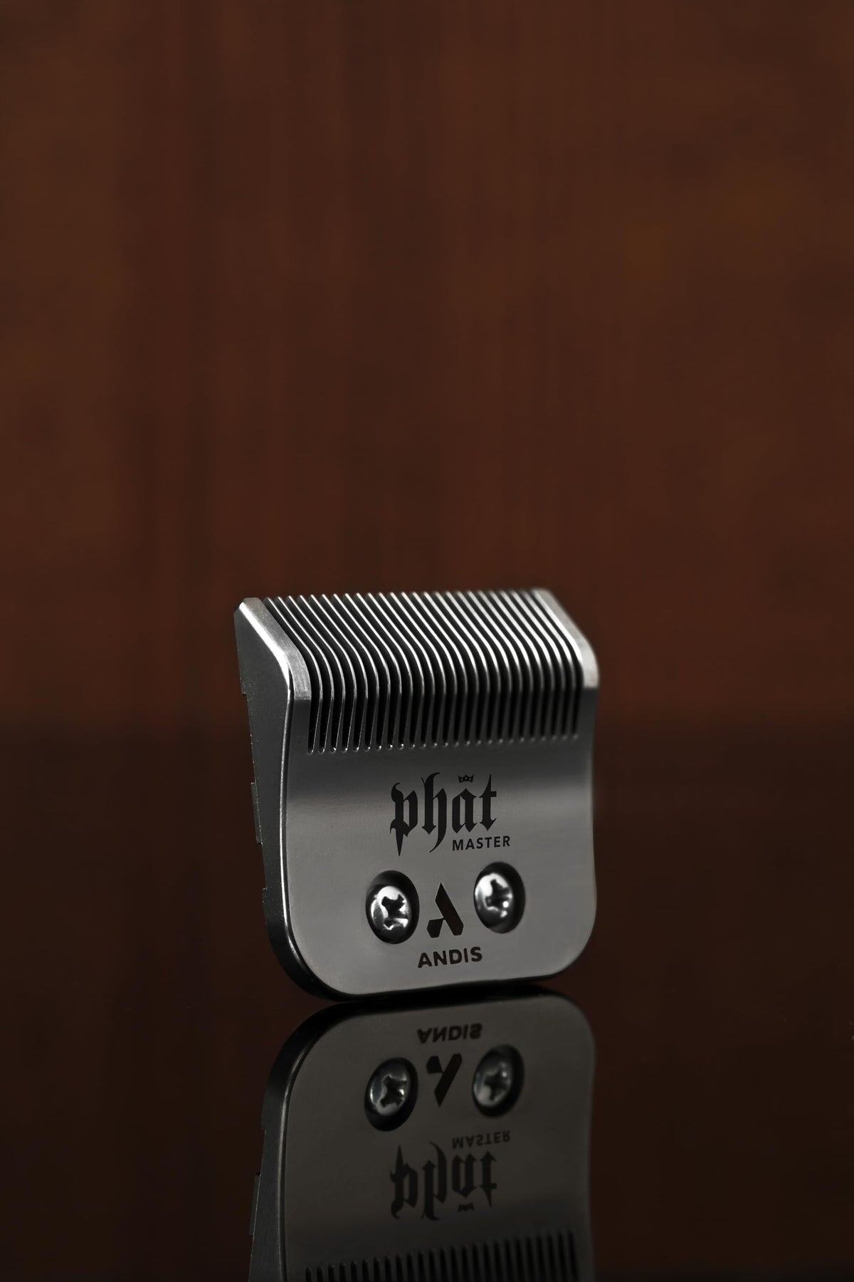 Close-up of Andis Phat Master Replacement Blade showing carbon-steel teeth