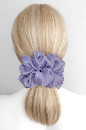 Close-up of AnnushkaHomeDecor scrunchie showing soft chiffon texture