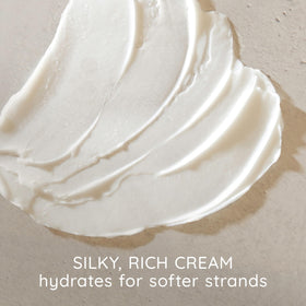 Close-up of Aveeno Oat Milk Blend Conditioner texture