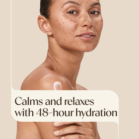 Close-up of Aveeno Stress Relief Body Lotion texture on hand
