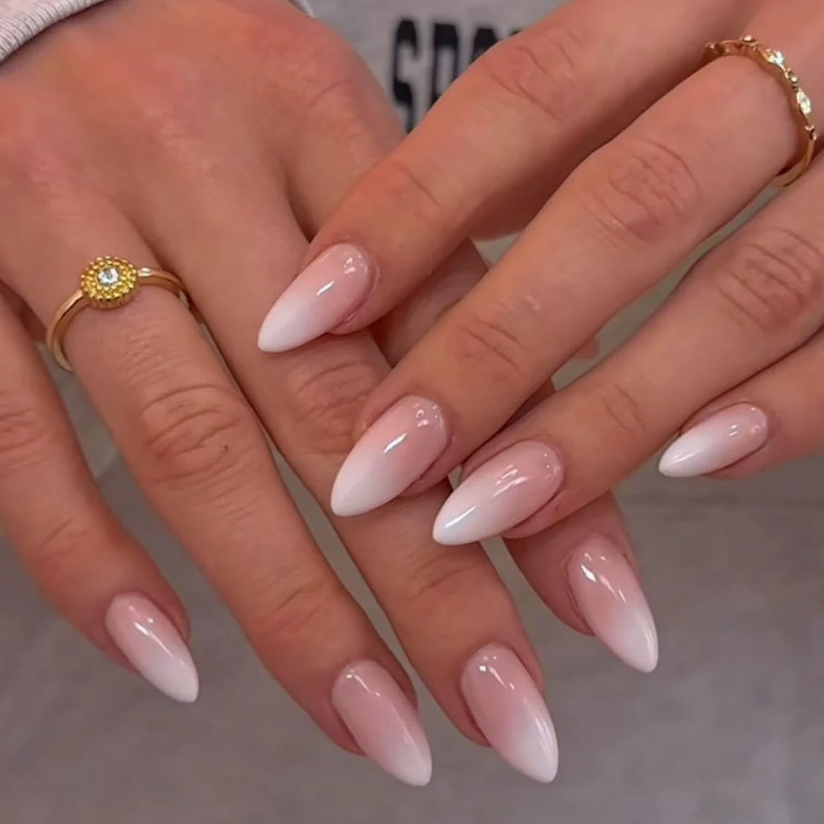 Close-up of AZUREBEAUT Short Almond Ombre Press On Nails with jelly adhesive tabs