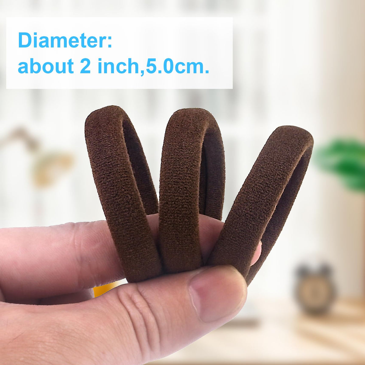 Close-up of BAOLI brown hair ties showing strong stretch