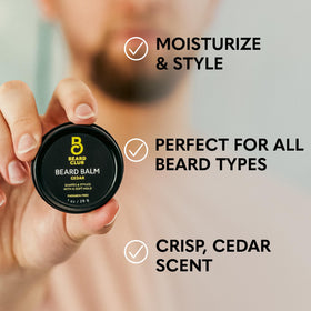 Close-up of beard oil bottle and brush