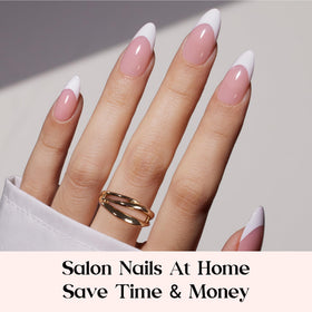 Close-up of Beetles medium almond nails with pink and white design