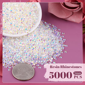Close-up of BELLEBOOST 3mm resin rhinestones with tweezers