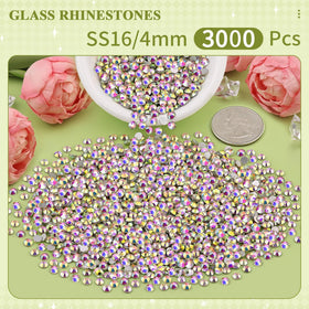 Close-up of BELLEBOOST Crystal Glass Rhinestones with tweezers