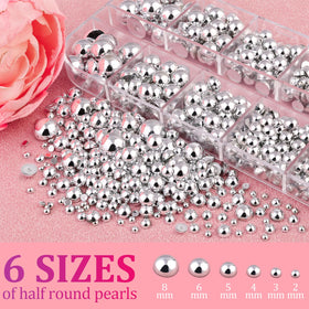 Close-up of BELLEBOOST Flatback Nail Pearls with picker pencil and tweezers