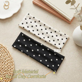 Close-up of black and white polka dot headband