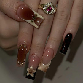 Close-up of BLGTGH leopard print press on nails with floral design