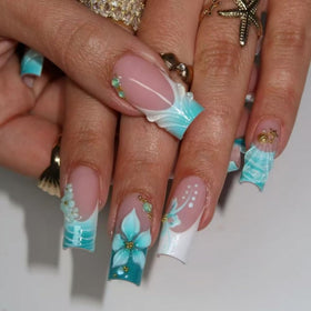 Close-up of BLGTGH square fake nails with floral design