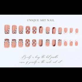 Close-up of BLGTGH tortoise shell design on press on nails