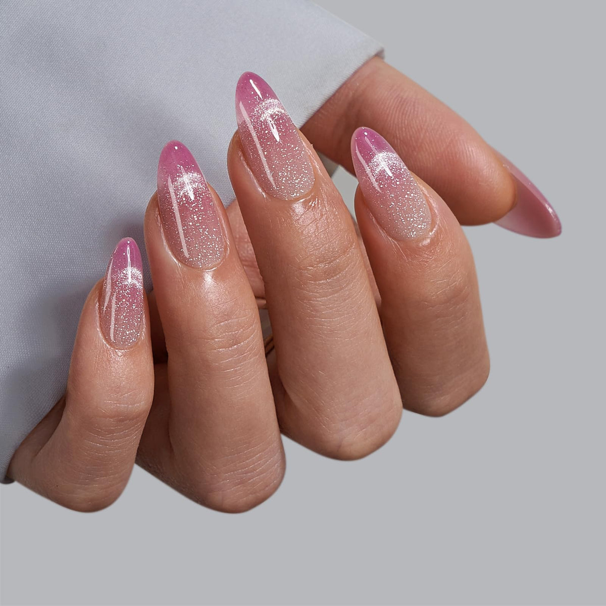 Close-up of BTArtbox Press On Nails Rosy Dew pink cat eye finish