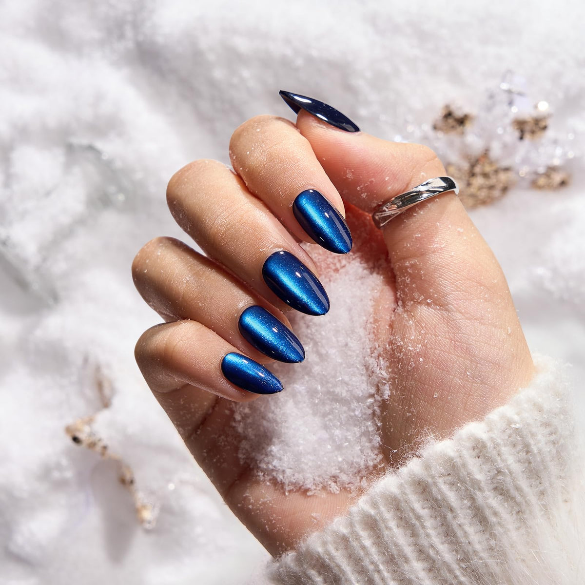 Close-up of BTArtbox Press On Nails showing the blue cat eye effect