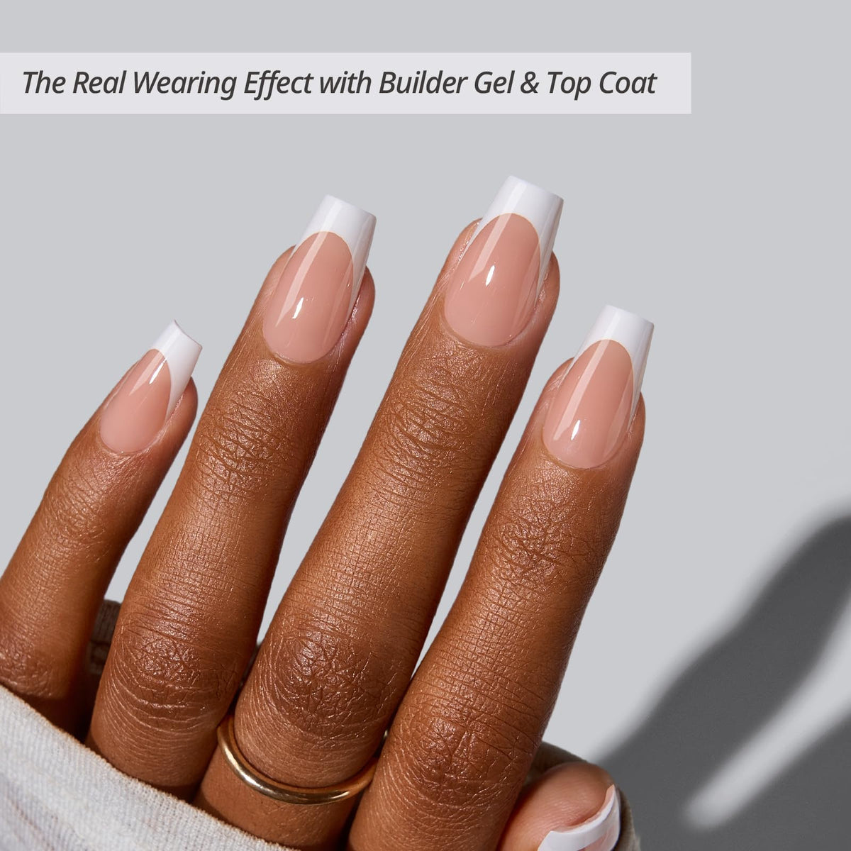 Close-up of BTARTBOXNAILS French Tip Press On Nails showing the coffin shape