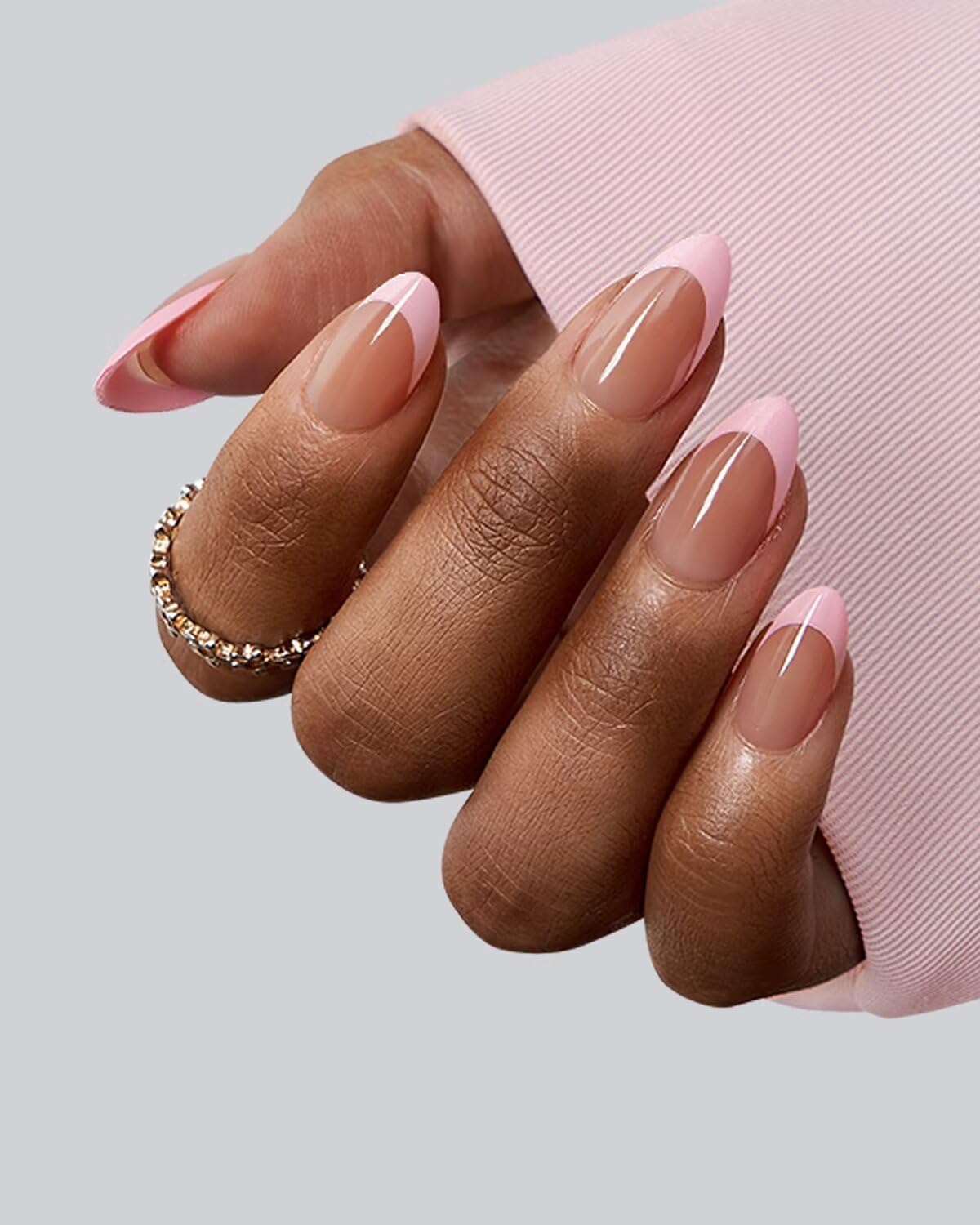 Close-up of BTARTBOXNAILS Pink French Tip Press On Nails showing almond shape