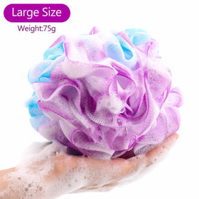 Close-up of BTYMS loofah sponge showing soft mesh texture