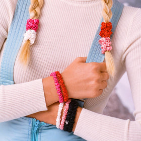 Close-up of Camellia SLIP Silk Skinny Scrunchie