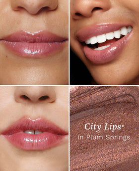 Close-up of City Beauty Plumping Lip Gloss Plum Springs applicator